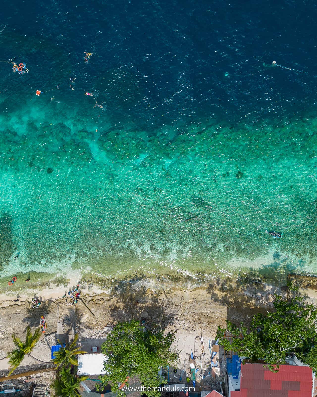 panagsama beach,moalboal sardine run, tourist spots cebu, best attractions cebu, things to do on cebu island, cebu itinerary, moalboal sardines, cebu sardine run, moalboal snorkelling, philippines, sea turtlea, panagsama beach drone