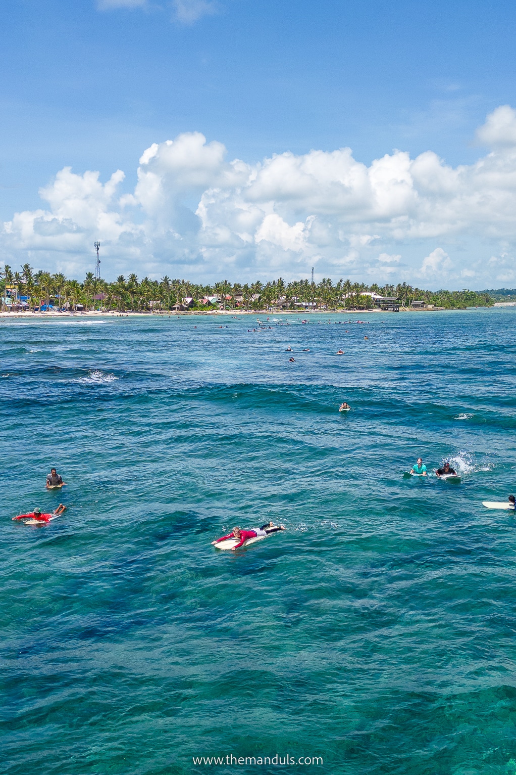 Surfing Cloud 9 Siargao